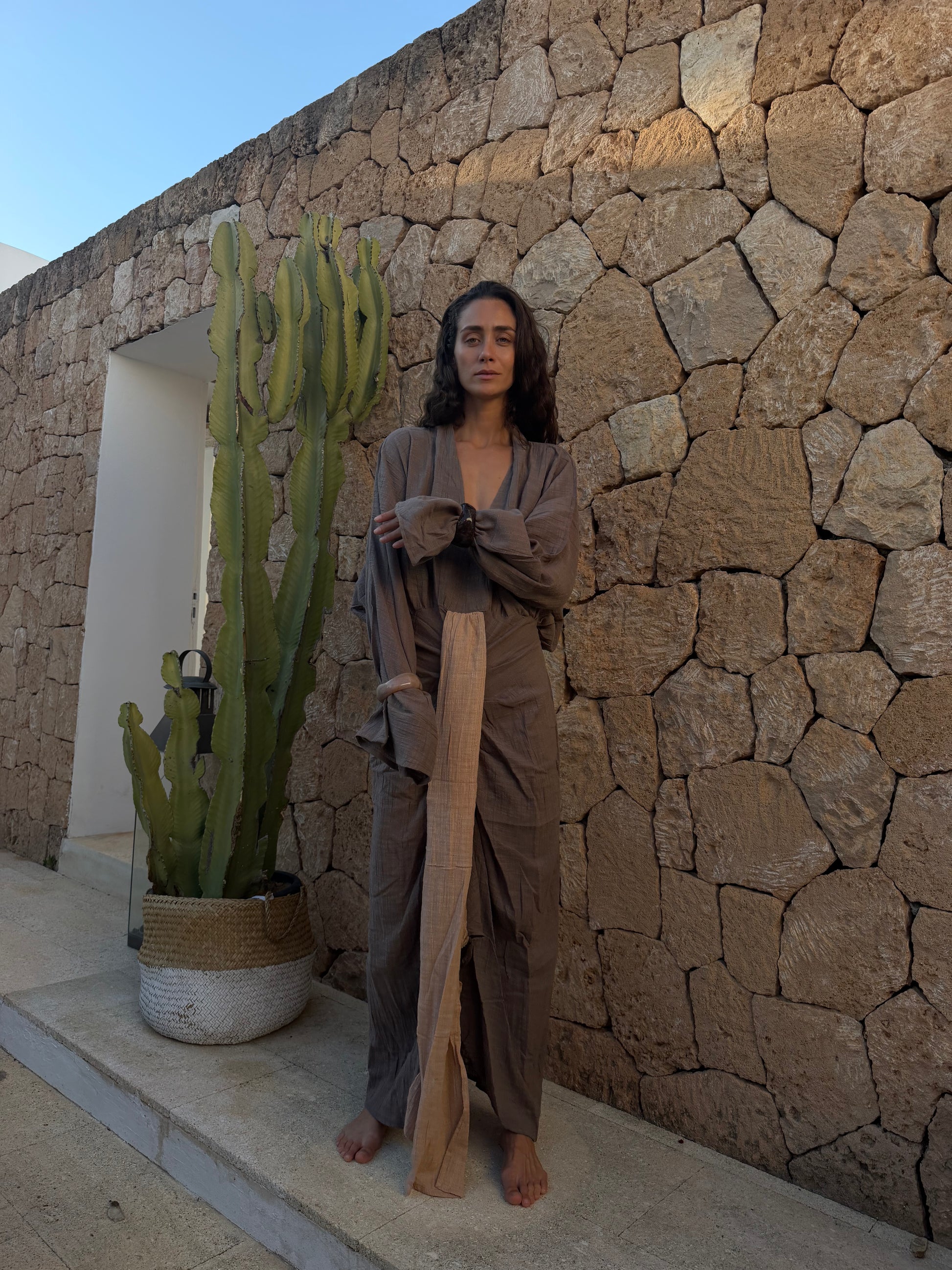 Elegant cotton kaftan layered over trousers for modern boho fashion