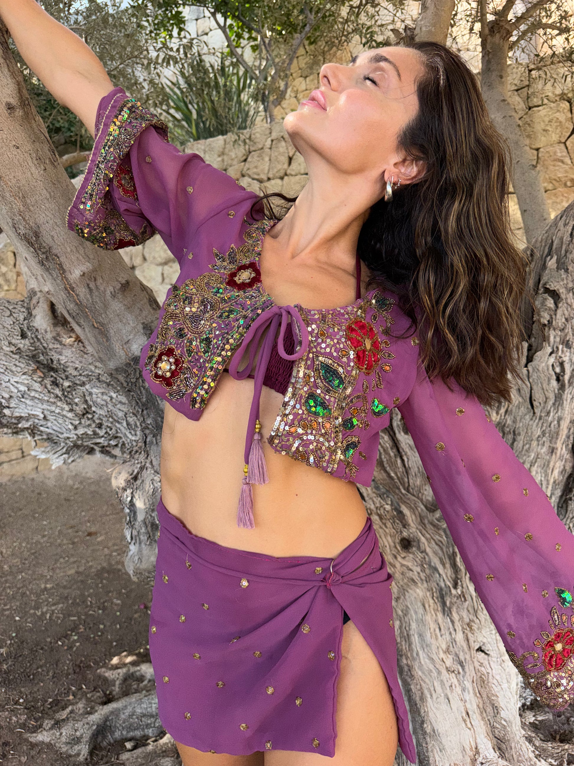 Cut from a saree that already lived a life. Sequins catch light the way only hand-beading does — uneven, imperfect, real.